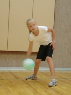 rolling a ball with one hand