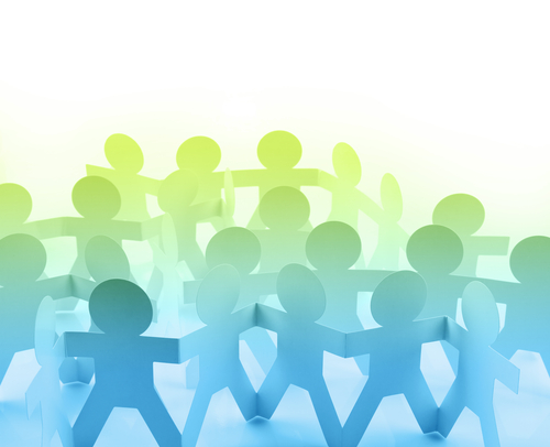 Paper doll people holding hands