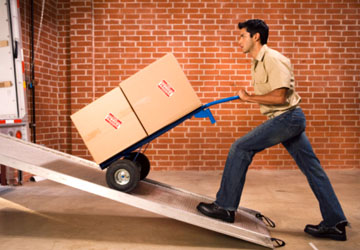 Man loading boxes onto a truck