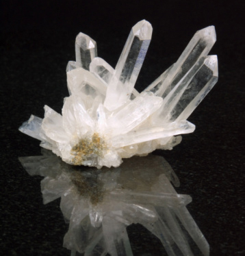 a quartz crystal: a 6 sided prism with 6 pyramids at the ends of the crystal 