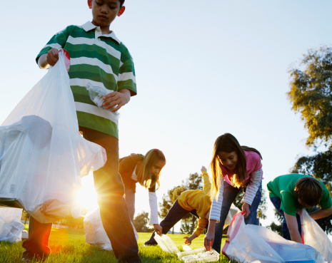 kids picking up trash