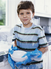 boy washing dishes