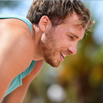 man resting after running outside