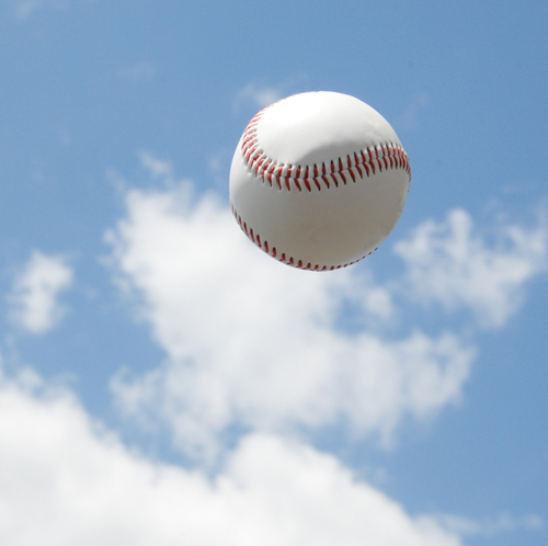 A baseball in the sky.