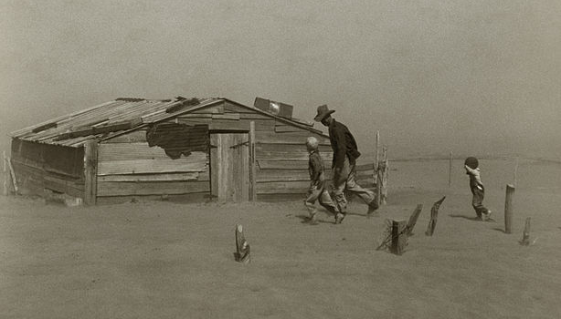 Farmer walking in dust storm Cimarron County Oklahoma