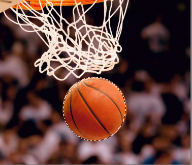 A basketball in midair with a circle selection shown