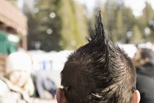 closeup of a young man's mohawk