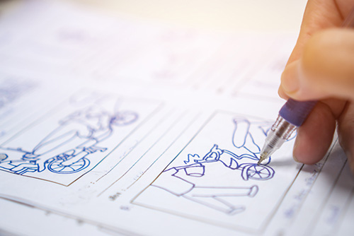 Artist working on a storyboard