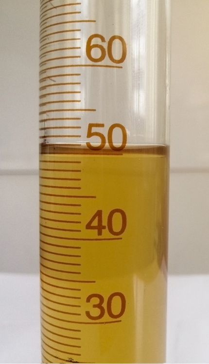 Liquid C in a graduated cylinder contains liquid 50 liters