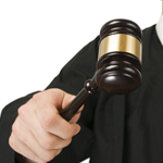 judge with gravel raise the finger