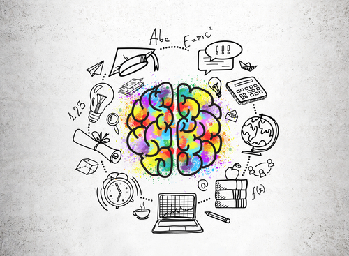 Colorful brain sketch in the center of education icons and drawings on a concrete wall. Concept of knowledge and a digital age.