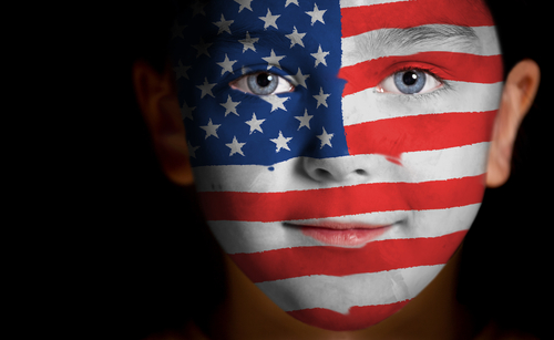 Portrait of a child with a painted American flag, closeup