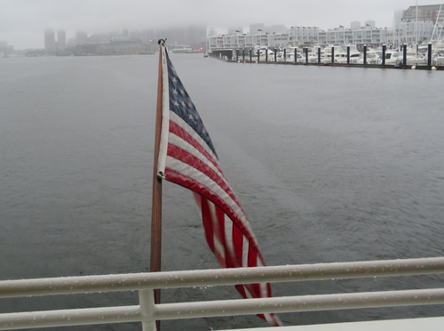 US Flag on Boat in Foggy Boston Harbor