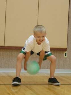 rolling a ball with two hands