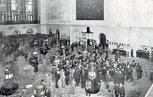 Stock exchange floor filled with people.