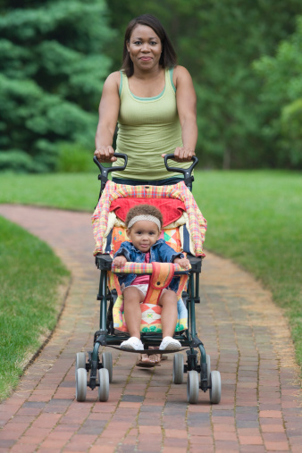 Woman pushing stroller