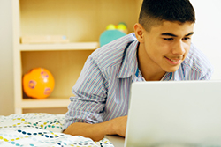 Guy working on computer