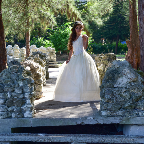 Havana, Cuba - Jan 14, 2017: A 15 year old cuban girl celebrates her birthday (quinceanera), in the Parque Almendares in Havana, Cuba.