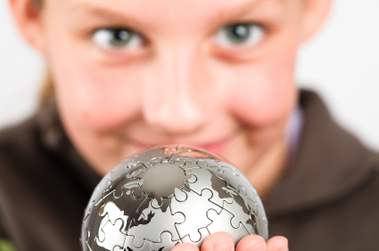 boy holding globe puzzle solved