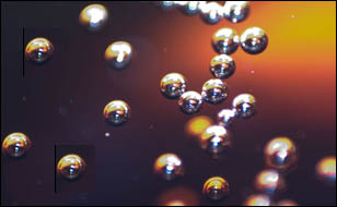 Soda bubbles macro. CO₂ is precipitating out of water solution.