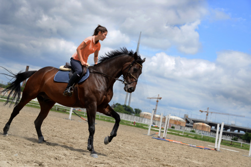 Girl Riding Horse
