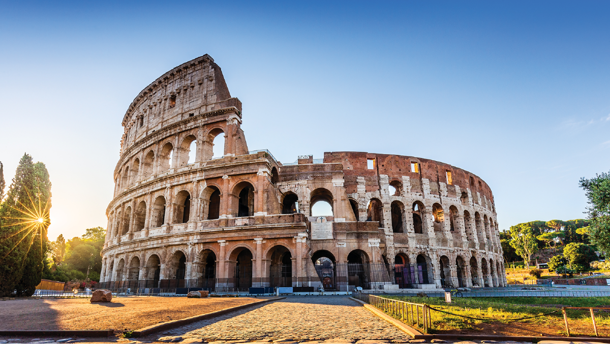 A picture of the colliseum with a broken edge of the top two tiers.