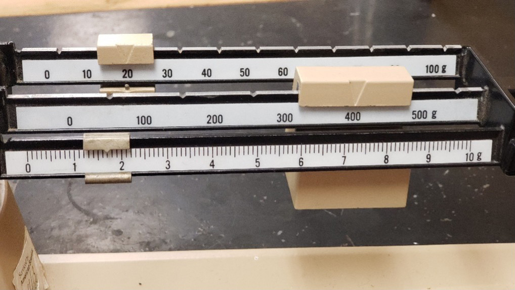 Balance A measuring 241.7 g