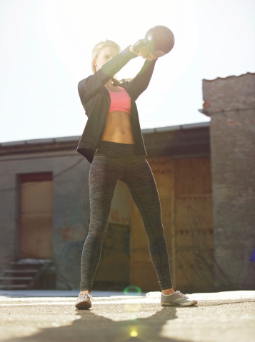 Woman with medicine ball
