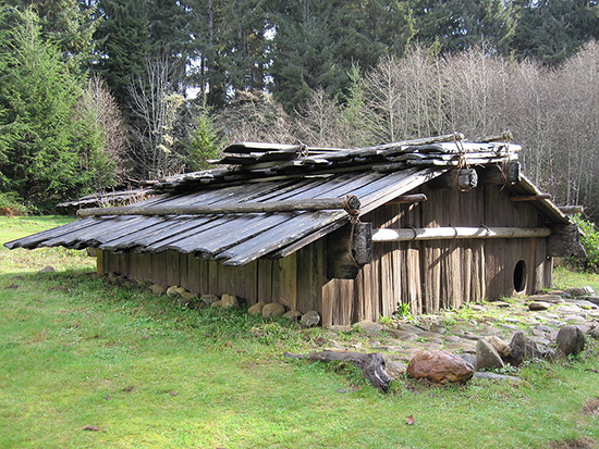 Traditional Yurok Indian family house at the Sumêg Village, located inside Patrick's Point State Park, northern California.