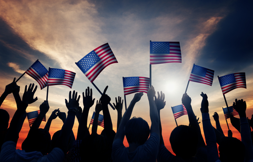 Group of People Waving Armenian Flags in Back Lit