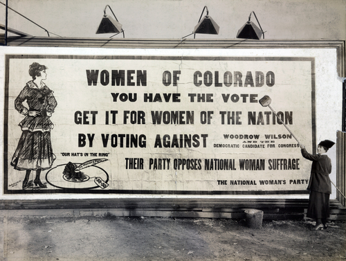 A 1916 billboard urges opposition to the Democratic Party for its stance against equality for women. 