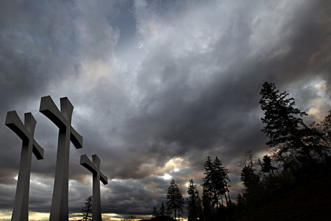 cross monuments with an overcast sky