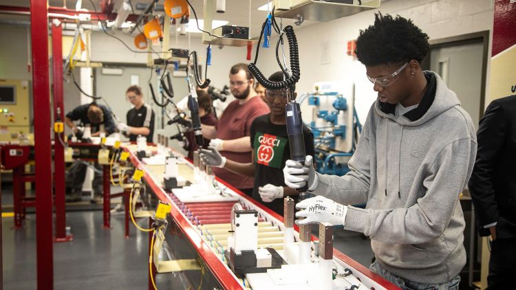 Doss Students Work on the Mock Assembly Line Doss Students Work on the Mock Assembly Line