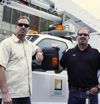 Twins Work Hand in Glove to Help Bring Power to Residents of Orange County