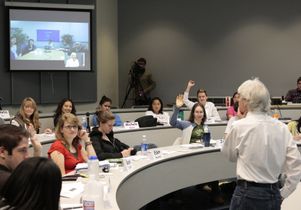 A professor leads a classroom discussion.