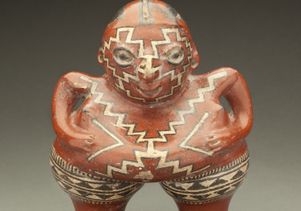 Polychrome female ceramic figure, 400-100 BCE