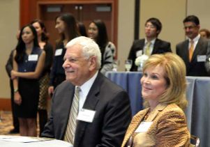 Albert and Robin Carnesale seated
