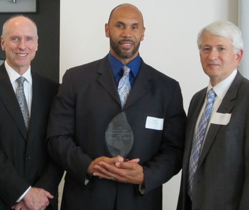 Darnell Hunt is flanked by Executive Vice Chancellor and Provost Scott Waugh (left) and Chancellor Gene Block at an event honoring Hunt, who was awarded the Academic Senate’s Diversity, Equity and Inclusion Award. 