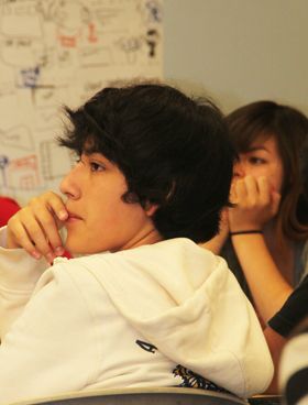 Two students listening