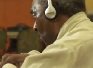 Henry listens to music 2 220 tall