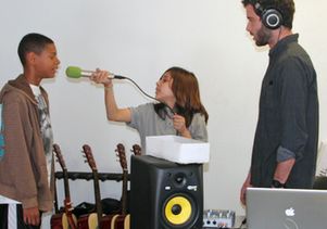 Students recording their rap song with Berkowitz