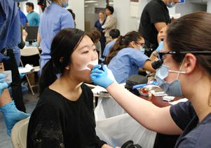 Woman being examined-thumbnail