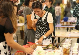 Woman shops at Arts ReSTORE