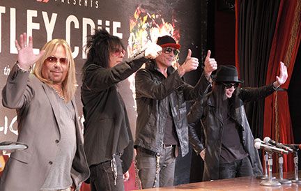 Motley Crue pose after press conference