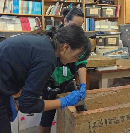 Hilo Sugita cleans sarcophogus