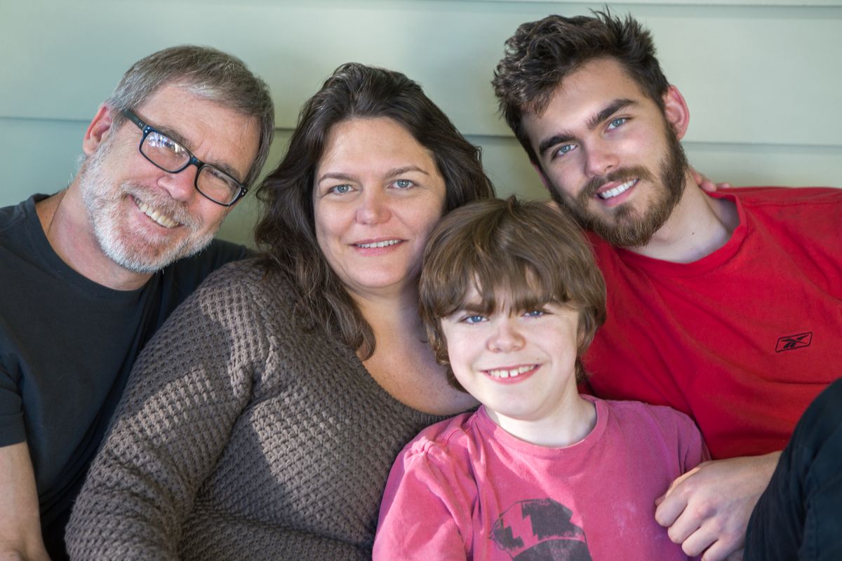 Dr. Stanley F. Nelson (from the left), M. Carrie Miceli and sons Dylan and Calvin Miceli-Nelson 