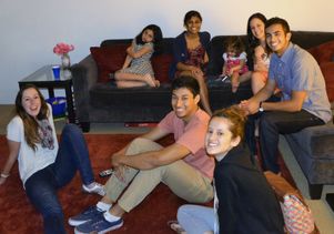 Students at Neil Garg’s home, along with his daughters