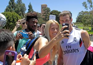 Abby Dahlkemper and Gareth Bale