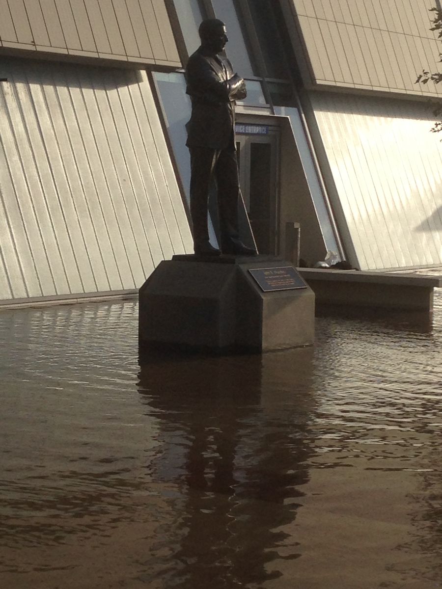 John Wooden statue flooded