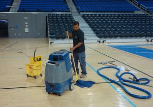 Mopping Pauley Pavilion court